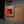 Window Edition sauna glowing red in a home garage